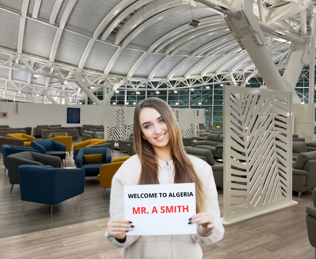 Woman holding a sign that says "Welcome to Algeria" in algiers airport lounge.